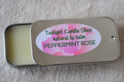 Natural peppermint and rose lip balm in old-fashioned sliding tin