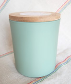 Sage and Citrus scented soy candle in 11 oz teal glass jar with wooden lid