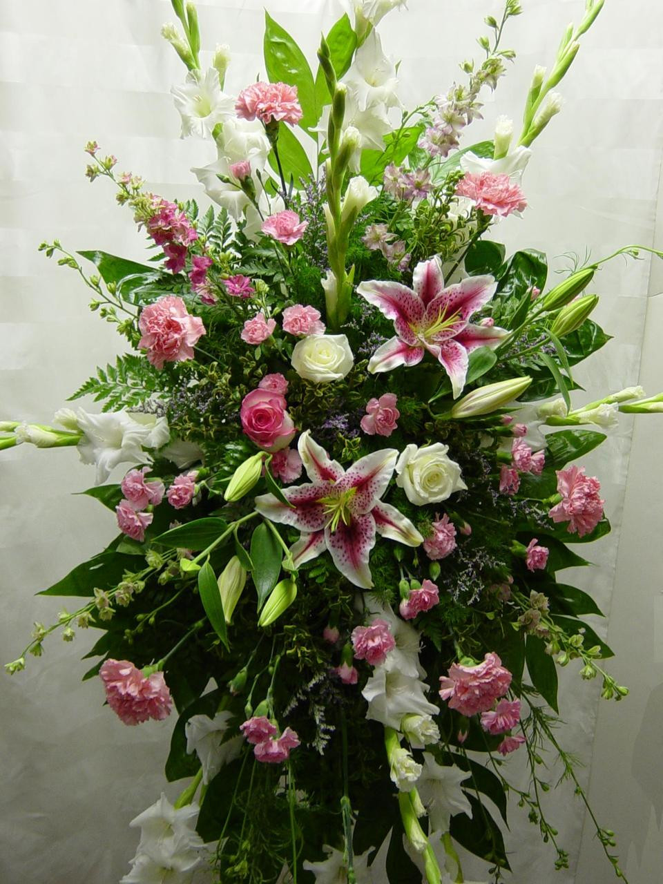 Tribute in Pink Sympathy Spray | Houston Funeral Flowers