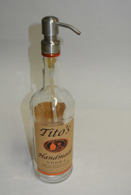 Recycled Glass Bottle
Wash your hands using an upcycled Tito's Handmade Vodka Bottle. This Bottle and Pump can be used for lotion too!
We only use stainless steel heavy duty and Sturdy pumps on our recycled bottles, which will pump even the Thickest Liquids.
Our sustainable eco friendly bottles make a great conversation pieces. Did you know by purchasing our products you are helping to keep glass out of landfills in California.
This year give a unique gift that helps our carbon footprint.
Reclaimed Bottles from Landfill Dzine are wrapped in our recycled bags