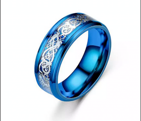 Stainless Steel Blue Celtic Dragon Design  With Silver  Carbon Fiber Inlay 

Comfort Fit

8mm

Sizes 6-13

Stainless steel
Tarnish Free
Hypoallergenic
Nickel free
All our jewelry is made to last for many years of wear. You can shower and go in a pool with all our stainless steel without fear of Tarnish guaranteed