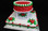 2 tier cake
10" & 3/4 sheet squared
serves approx 75-100 people
cream decorations!!!