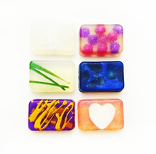 Our handcrafted glycerin soaps are each uniquely designed and highly fragranced.  Glycerin is a humectant that draws moisture to the skin without stripping the natural oils .  Our soaps are not only a beautiful addition to your bath, but a wonderful moisturizing cleanser for your precious skin.