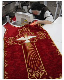 Sister sewing Pentecost vestment Sisters sewing red vestment, pentecost vestment