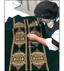 Sister pulls in stray threads on the vestment embroidery Vestment Embroidery