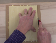 Trim the veneer with a razor knife to get an exact fit