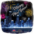 Black balloon with a printed city skyline image and above the buildings are colorful fireworks with "Happy New Year" in white lettering