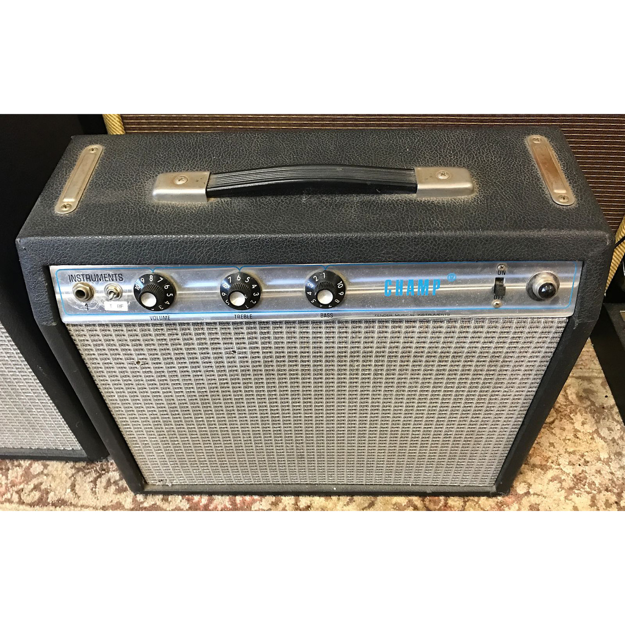 Sold 1976 Fender Champ Boston Guitar