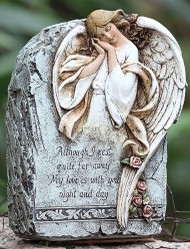  Stone with an angel drawing and inscription that says “Although I rest quite far away, My love is with you night and day.”