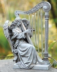 Angel statue playing the harp. 