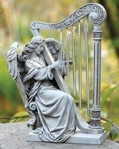 Angel statue playing the harp. 