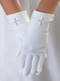 First Communion Matte Satin White Gloves with Pearl Cross.. Gloves come in sizes 4-7 or 8-14. Please make selection when checking out. 