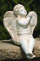 Cement Sitting Angel Blowing Kiss. H: 14.5", W: 9.5", L: 10.5", Wt: 14 lbs. Made to order...Allow 3-4 weeks for delivery if not in stock. Made in the USA!