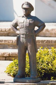 42.5"H Police Officer Cement Garden Statue. Weight: 128lbs. Dimensions: 42.5"H x 12.5"W x 11.5"L. All statuary is custom made. Please allow  3-4 weeks for delivery.