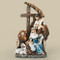 Figurine of Holy family with cross stable and barn animals. 
