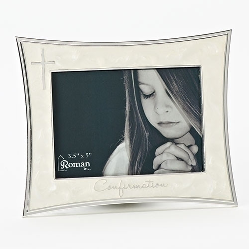 5.5" Ivory Confirmation Frame from the Caroline Collection. Holds a 4" x 6" picture. Adorned with a silver cross on left side and the word "Confirmation" across the bottom of frame. Zinc alloy, lead free.