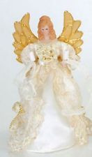 10" Angel's gown embroidered with gold and sequins. 10 miniature clear steady burning bulbs with white wire.  10"H x 5"W x 5"D ~ Material(s): fabric/porcelain/plastic/glass