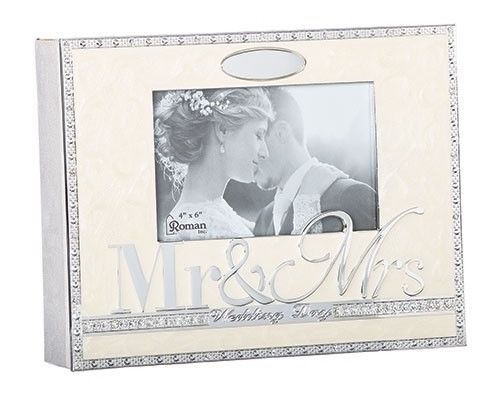 From the Caroline Collection this beautiful wedding photo album holds 156 4" x 6" photographs. The album measures 8.5" in hieght. Made of zinc alloy. Lead free