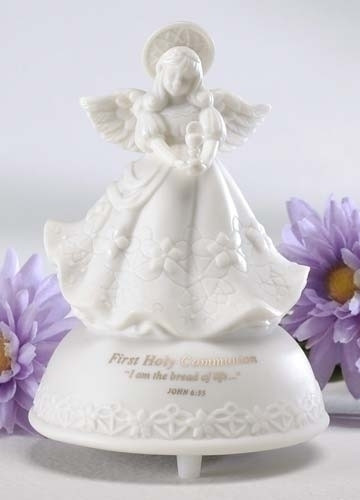 5" First Holy Communion Musical Angel made of porcelain. Message says "First Holy Communion - I am the bread of life...". Tune- The Lord's Prayer. Measurements: 5" height x 3.5" diameter. Gift Boxed.