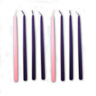 Two sets of Advent Candles laid side by side.