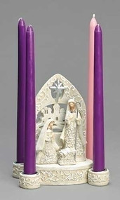 Central Nativity scene with four taper Advent candles at each corner
 

 