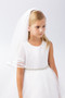 This simple Communion Headpiece has a thin border of white satin.
