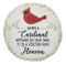 Stepping Stone "When a Cardinal appears in your yard, it is a visitor from Heaven." Polystone. Stepping stone also has a hook for hanging. Colors are Grey, Black and red. 11" diameter