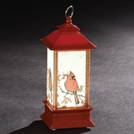 5" LED Lantern with Cardinal Ornament. Ornament is made of plastic and measures 5"H x 2"W x 2"D