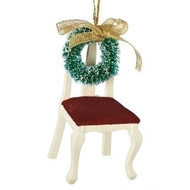 Memorial Chair Ornament. 3.5" chair has a wreath on the back of chair. 3.5"H Chair with wreath memorial is made of wood and complete measurements are: 3.5"H 1.75"W 1.75"D