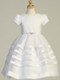 Satin with organza overlay bodice
Organza skirt with satin trim
Beaded belt
Bow in the back at waistline
Cap-length puff sleeves
Tea length
Made in the U.S.
3 dress limit per order!
