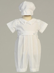 Poly seersucker cotton romper with pleats. Hat is included. Sizes: 0-3mos, 3-6mos, 6-12mos, 12- 18mos. Made in the USA