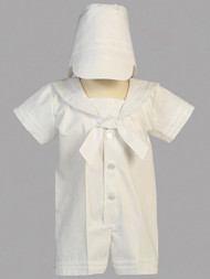 Polyester and cotton sailor outfit christening set. Hat is included. Sizes: 0-3mos, 3-6mos, 6-12mos, 12- 18mos. Made in the USA
