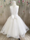 This dress is made with high-quality materials, including organza, French net, and bridal satin.
The dress is embellished with embroidery, pearls, sequins, and crystals.  If you are looking for a simple, yet stunning First Holy Communion dress for your daughter, this is a great option. The simple style paired with the beautiful detailing creates a dress that your little one will absolutely love. Start shopping for your daughter or granddaughter’s communion dress now!
Details:
Diamond White Organza, French net, and satin
Pearl and crystal detailing
Buttons in back
Multiple sizes
Please call us at 1.800.523.7604 for verification of items in stock as they are selling quickly!
Items are non returnable