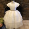  We are proud to feature Christie Helene's Couture Collection of custom communion dresses. Each dress is custom made to perfectly fit your child. The Couture Collection dresses are made with the finest materials including raw silk, taffeta, and/or bridal satin and embellished with embroidery, pearls, sequins and/or crystals. Please call us at 1.800.523.7604 for instructions on measuring your child and allow 8 to 10 weeks for delivery. Half sizes are available at an additional cost. 