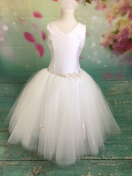 From the Couture Collection. We are proud to feature Christie Helene's Couture Collection of custom communion dresses. Each dress is custom made to perfectly fit your child. The Couture Collection dresses are made with the finest materials including raw silk, taffeta, and/or bridal satin and embellished with embroidery, pearls, sequins and/or crystals. Please call us at 1.800.523.7604 for instructions on measuring your child and allow 8 to 10 weeks for delivery. Half sizes are available at an additional cost. 