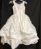 This dress is made with high-quality materials, including organza, French net, and bridal satin. If you are looking for a simple, yet stunning First Holy Communion dress for your daughter, this is a great option. The simple style paired with the beautiful detailing creates a dress that your little one will absolutely love. Start shopping for your daughter or granddaughter’s communion dress now. 
Please call us at 1.800.523.7604 for verification of items in stock as they are selling quickly!  Items are non returnable!