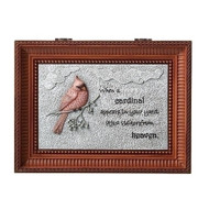 Cardinal Bird Bereavement Music Box. Lid of the box has a Cardinal on a branch with the words "When a cardinal appears in your yard it is a visitor from heaven." Music Box plays "Nocturne".  Measurement: 3"H x 6"W x 8"D. Made of Plastic and Metal