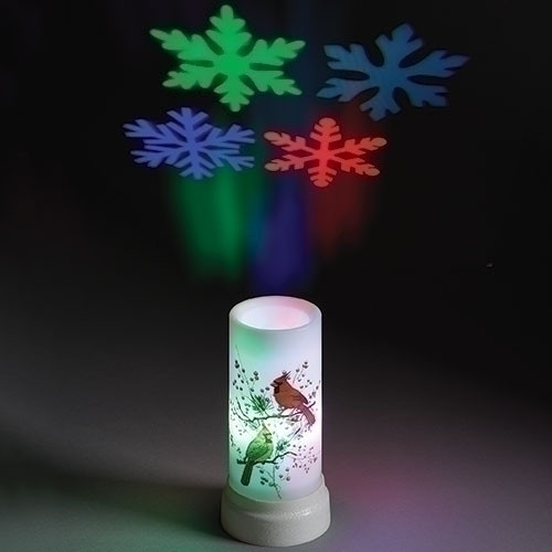 Celebrate the Season with this 6.75"H LED Snowflakes Projector Candle with USB Cord. Measurements are 6.75"H x 3.625Dia.  LED Snowflakes Projector Candle is made of plastic. Batteries not included.