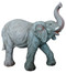 Large fiberglass and resin elephant with its trunk raise and one foot in the air. 