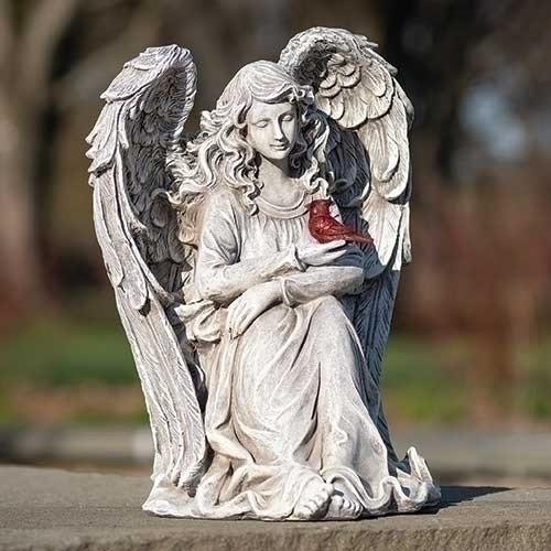 Cardinal Memorial Angel Statue. Statue is an 11" Angel holding a Cardinal. A wonderful remembrance of someone we have lost. Statue is made of a resin/stone mix. 