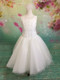 Give your little girl the highest quality dress for her special day!
Our dresses are made with the finest materials.
and are decorated with the highest-quality embellishments.
Custom made First Communion dresses.
Long, short, and sleeveless communion dresses.
 With our collection of Christine Helene’s Signature/Angel custom communion dresses, you are assured that your child’s first communion is truly a special occasion. This dress is guaranteed to make your special girl shine. It has short sleeves, and is made with the highest quality fabric and crystal embellishments at the waist of the dress. 
What’s included:
Diamond White Organza
Diamond White French Net
Diamond White Bridal Satin
Embroidery
Pearls
Sequins
Crystals
We pride ourselves in helping make your child’s first communion the best it can be. Please call us at 1.800.523.7604 for verification of items in stock as they are selling quickly! No returns or exchanges!

 