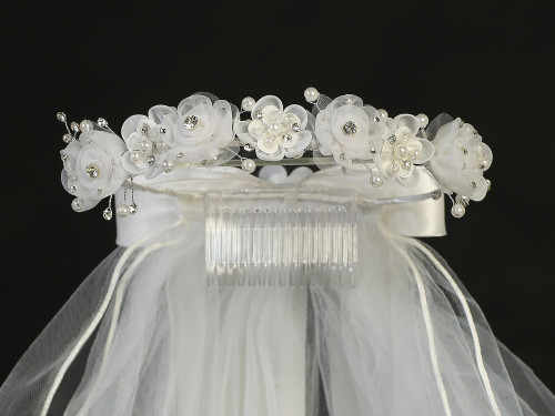 24" Veil with Organza Flowers, Rhinestones & Pearls on Crown. 
Satin Bow at the back. 
Made in the USA

