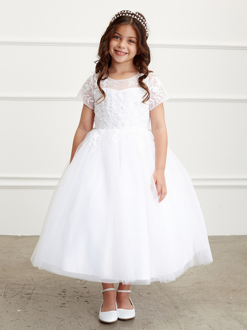 Floral lace applique bodice with short sleeves and an illusion neckline.
Create a First Communion look as sweet and sparkly as your little girl. In this floral lace bodice with an illusion neckline, your girl will feel extra special during this momentous occasion. 
Floral lace applique bodice with a illusion neckline
Short-sleeved dress
Ankle length
Made in the U.S.A. 
3 Dress Limit Per Order