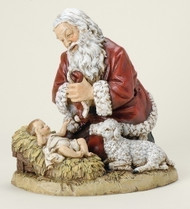 Kneeling Santa with Lamb Figure. Resin/Stone Mix. Available in 2 sizes, please select: 8"H x 8.75"W x 6.75"D or 13"H x 13"W x 10"D.