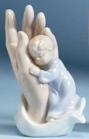Porcelain Statue of a Boy in the "Palm of a Hand". Perfect Gift for a Baptism! 4.38"H 3"W 2.25"D 