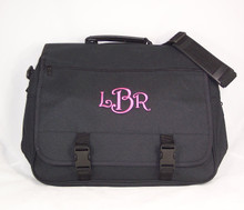 This monogrammed expandable briefcase was stitched with hot pink thread using the Harrington Letter Style.
