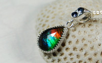 Ammolite Jewelery Pendant.Rich faceted multicolor