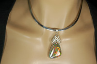 Ammolite pendant on a solid sterling silver circlet or Torc.