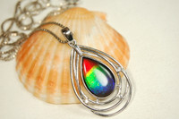 Ammolite Jewelry Pendant.RARE four color quality rainbow.