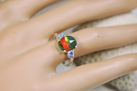 Ammolite ring with brilliant facets